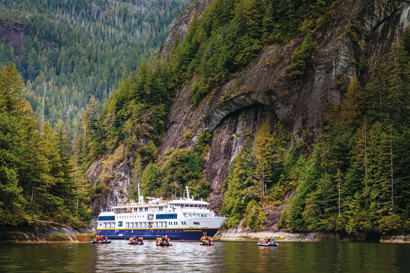 Guests explore by zodiac from the ship National Geographic Quest in Rudyerd Bay, Misty Fjords National Monument Wilderness, Ketchikan, Alaska, USA