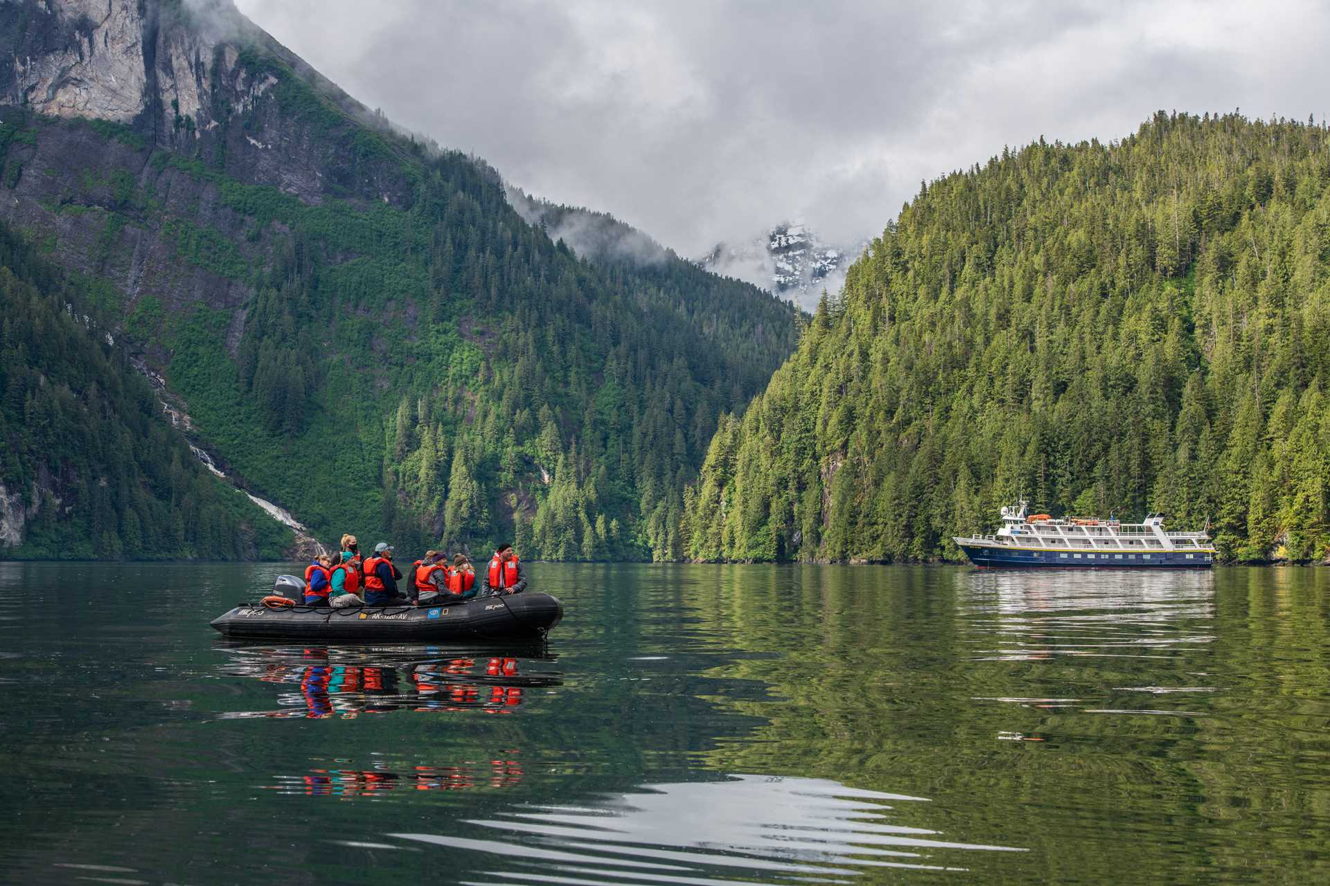 Guests explore by zodiac from the National Geographic Sea Lion, Owl Pass in Rudyerd Bay, Misty Fiords National Monument, Ketchikan, Alaska.