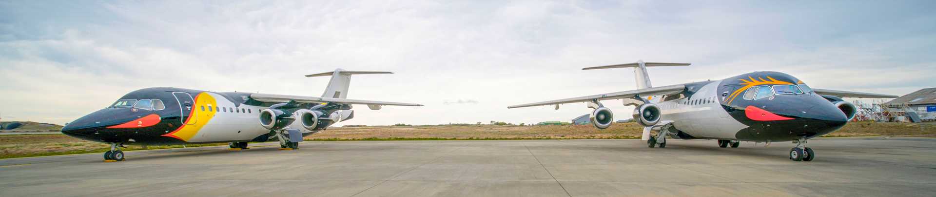 Two planes on a tarmac.